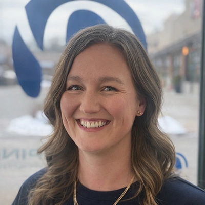 A headshot photo of Dr. Danielle Rasmussen, a chiropractor at Alpha Spine Health & Injury Center